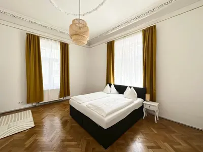 Ein Bett oder Betten in einem Zimmer der Unterkunft Boutique Hotel Columbia