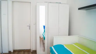 Ein Bett oder Betten in einem Zimmer der Unterkunft Sweet 2BR Apt, Near Schloss Belvedere & Rennweg
