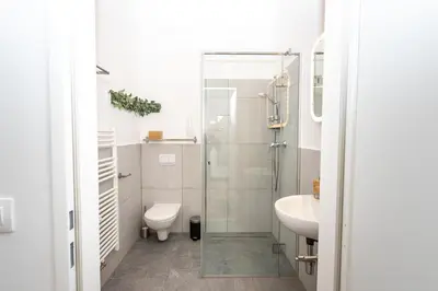 Ein Badezimmer in der Unterkunft Radiant Premium Apartments - Central