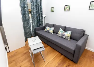 Ein Sitzbereich in der Unterkunft Radiant Premium Apartments - Central