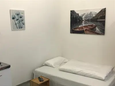Ein Bett oder Betten in einem Zimmer der Unterkunft Saralo Apartments 1050