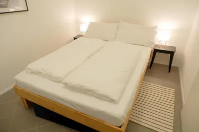 Ein Bett oder Betten in einem Zimmer der Unterkunft Apartments near Augarten