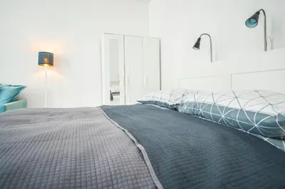 Ein Bett oder Betten in einem Zimmer der Unterkunft Gloriette Aparts - Wien Schönbrunn