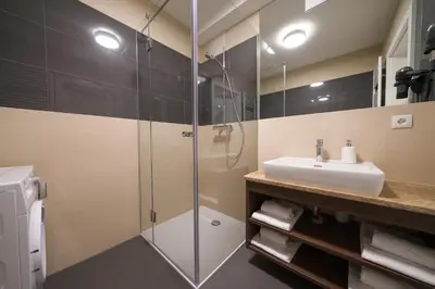 Ein Badezimmer in der Unterkunft MyApartments Vienna