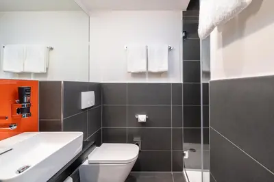 Ein Badezimmer in der Unterkunft Campanile Vienna South