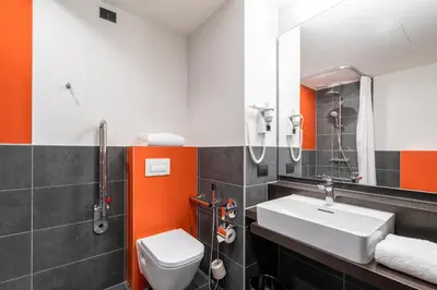 Ein Badezimmer in der Unterkunft Campanile Vienna South