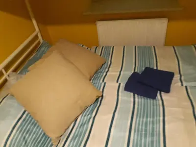 Ein Bett oder Betten in einem Zimmer der Unterkunft Monterooms Vienna Schönbrunn 10 minutes to downtown