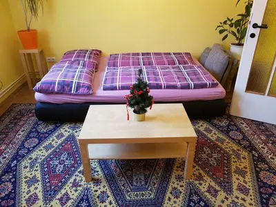 Ein Bett oder Betten in einem Zimmer der Unterkunft Garden Apartment Donau-City (P&R)
