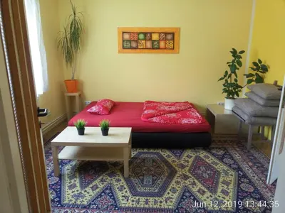Ein Bett oder Betten in einem Zimmer der Unterkunft Garden Apartment Donau-City (P&R)