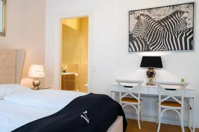 Ein Bett oder Betten in einem Zimmer der Unterkunft Vienna Residence, Naschmarkt - Museumsquartier