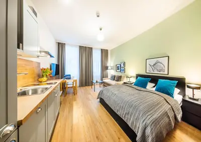 Ein Bett oder Betten in einem Zimmer der Unterkunft Jimmy's Apartments Emerald