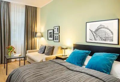 Ein Bett oder Betten in einem Zimmer der Unterkunft Jimmy's Apartments Emerald