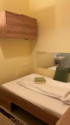 Ein Bett oder Betten in einem Zimmer der Unterkunft Hostel Elisabeth
