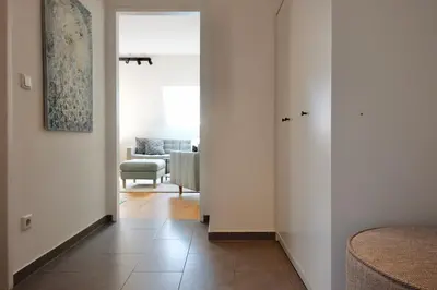 Ein Sitzbereich in der Unterkunft Triple A Apartments