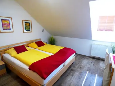 Ein Bett oder Betten in einem Zimmer der Unterkunft Appartementhaus Martina