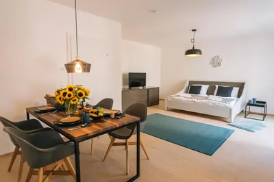 Ein Bett oder Betten in einem Zimmer der Unterkunft Wave Penthouses