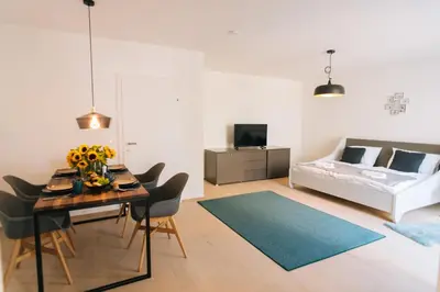 Ein Sitzbereich in der Unterkunft Wave Penthouses