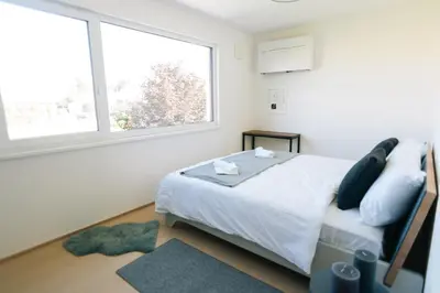 Ein Bett oder Betten in einem Zimmer der Unterkunft Wave Penthouses