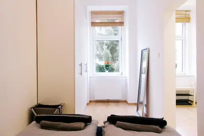 Ein Bett oder Betten in einem Zimmer der Unterkunft Bright, central and stylish apartment