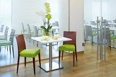 Ein Restaurant oder anderes Speiselokal in der Unterkunft Good Rooms GmbH Guntramsdorf