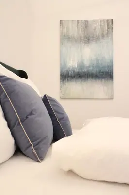 Ein Bett oder Betten in einem Zimmer der Unterkunft Oskar Kokoschka - City Apartment Downtown Vienna