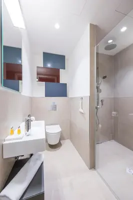 Ein Badezimmer in der Unterkunft Luxury Suites Renngasse