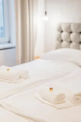 Ein Bett oder Betten in einem Zimmer der Unterkunft ZEUS Design Apartments - Reumannplatz