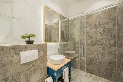 Ein Badezimmer in der Unterkunft ZEUS Design Apartments - Reumannplatz