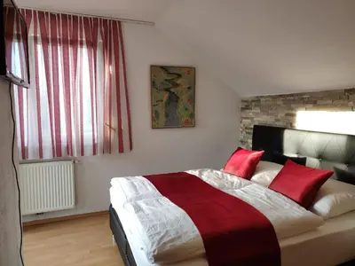Ein Bett oder Betten in einem Zimmer der Unterkunft Relax - Ferienhaus in Wien