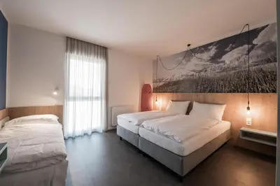 Ein Bett oder Betten in einem Zimmer der Unterkunft Lakeside77