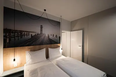 Ein Bett oder Betten in einem Zimmer der Unterkunft Lakeside77
