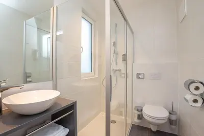 Ein Badezimmer in der Unterkunft Wilmas Apartments by Arbio