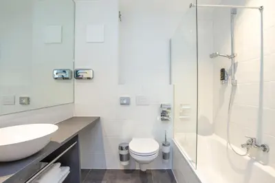 Ein Badezimmer in der Unterkunft Wilmas Apartments by Arbio