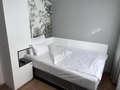 Ein Bett oder Betten in einem Zimmer der Unterkunft Wilmas Apartments by Arbio