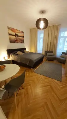 Ein Bett oder Betten in einem Zimmer der Unterkunft Angelika Apartments