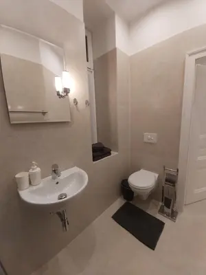 Ein Badezimmer in der Unterkunft Angelika Apartments