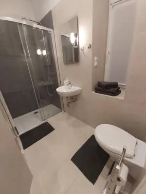 Ein Badezimmer in der Unterkunft Angelika Apartments