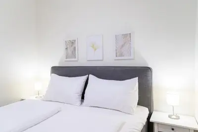 Ein Bett oder Betten in einem Zimmer der Unterkunft Beautiful apartment in Vienna's Heart 1c