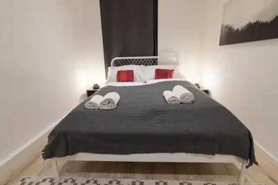 Ein Bett oder Betten in einem Zimmer der Unterkunft Yeshello Belvedere Apartment