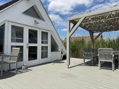 Ein Balkon oder eine Terrasse in der Unterkunft Seehütte Neusiedlersee inklusive Boot