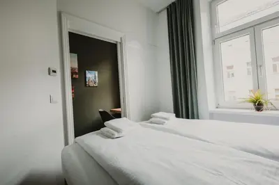 Ein Bett oder Betten in einem Zimmer der Unterkunft ZEUS Design Apartments Lovely Home Vienna
