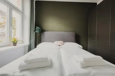 Ein Bett oder Betten in einem Zimmer der Unterkunft ZEUS Design Apartments Lovely Home Vienna