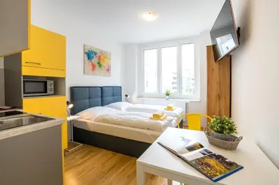 Ein Bett oder Betten in einem Zimmer der Unterkunft FeelGood Apartments SmartLiving | contactless check-in