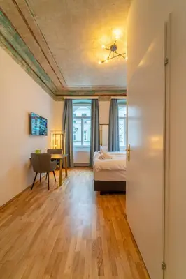 Ein Bett oder Betten in einem Zimmer der Unterkunft josef's home I Renaissance Studio