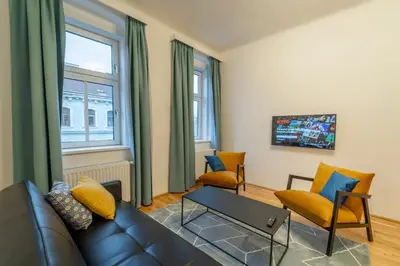 TV/Unterhaltungsangebot in der Unterkunft josef's home I Maxi Apartment I near UNO, VIC