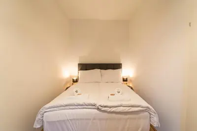 Ein Bett oder Betten in einem Zimmer der Unterkunft josef's home I Maxi Apartment I near UNO, VIC