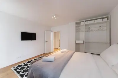 Ein Bett oder Betten in einem Zimmer der Unterkunft Vienna City Apartments Castelligasse