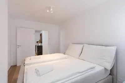 Ein Bett oder Betten in einem Zimmer der Unterkunft Vienna City Apartments Castelligasse