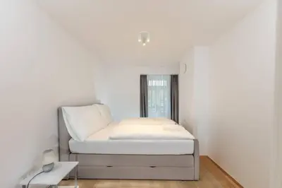 Ein Bett oder Betten in einem Zimmer der Unterkunft Vienna City Apartments Castelligasse