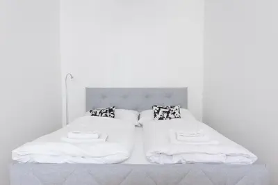 Ein Bett oder Betten in einem Zimmer der Unterkunft Vienna City Apartments Krongasse